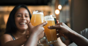 Women enjoying craft beer with friends