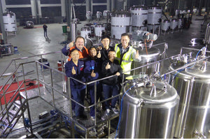 Geoff and Sven overseas testing brew tanks to bring back to Australia